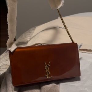 CASSANDRE PHONE HOLDER IN PATENT LEATHER